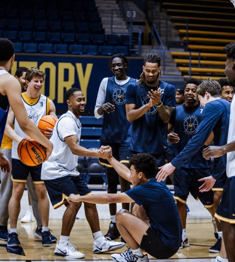 Bobby with Cal Men's Basketball players at practice